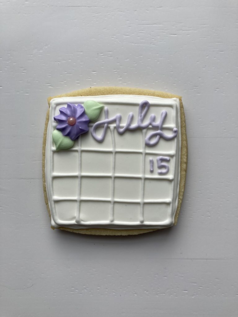 Single royal icing cookie for bridal shower