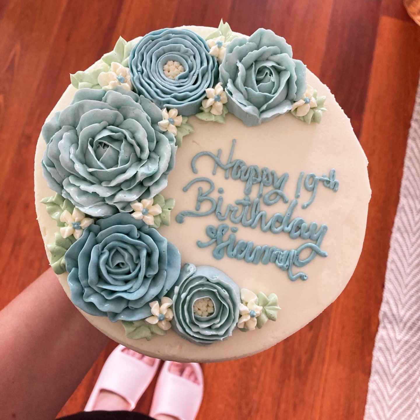 Happy birthday cake with blue flowers